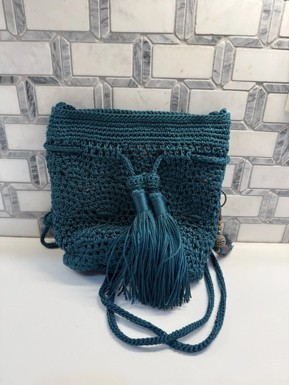 The Sak…Handmade Teal Crochet Crossbody Bag with Tassel - Picture 1 of 7